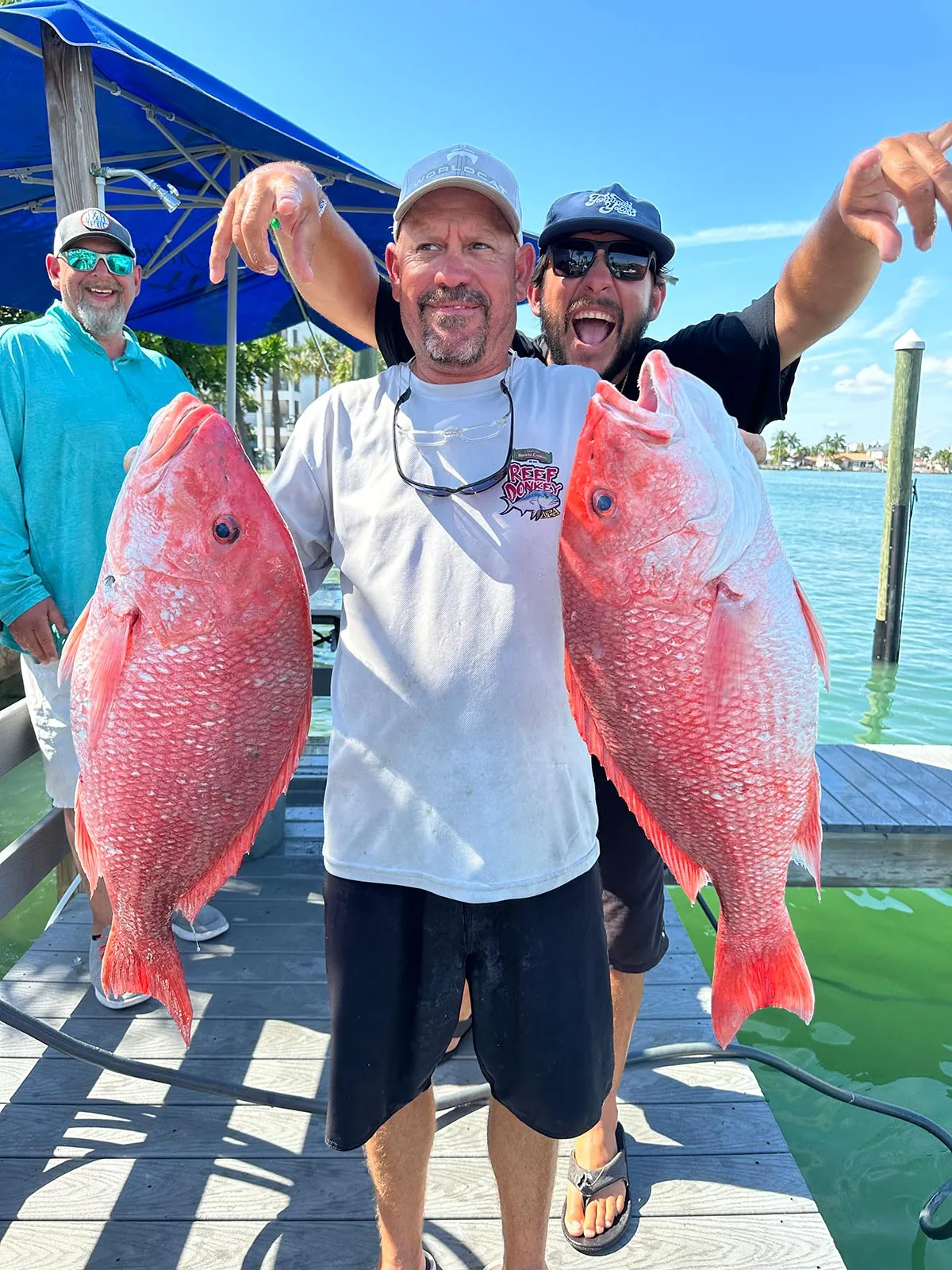 Guests on a private Gulf day charter from St. Petersburg aboard Phat Kat